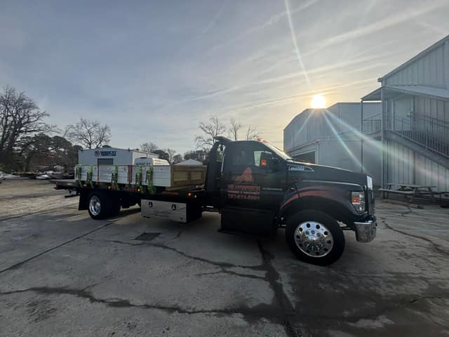 Industrial generator equipment hauled on the Silverback rollback